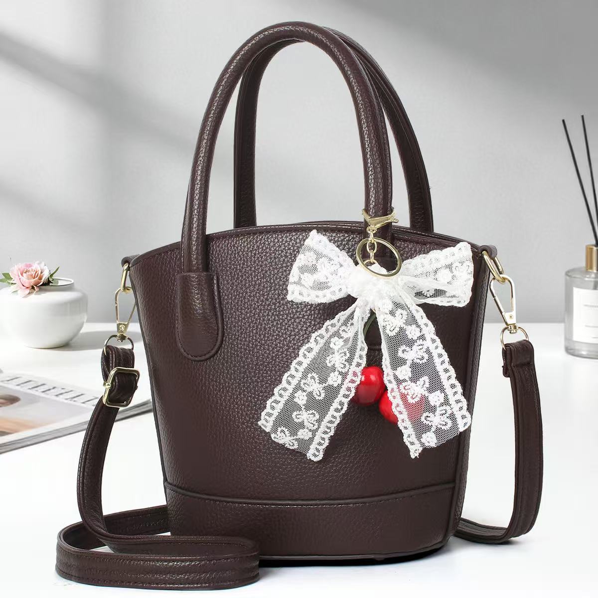 Cestas de verduras casuales simples bolsos de mano bolsas de cubo de viaje de moda colgante universal bolsas de hombro transfronterizas