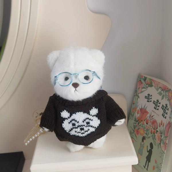 Brown sweater + blue glasses