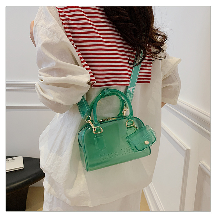 Verano nuevo bolso de almohada portátil de PVC transparente de jalea para mujeres este año popular alta textura mochila de hombro