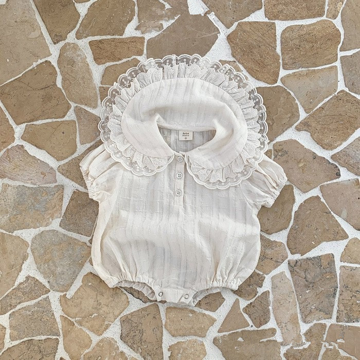 Niñas de verano con solapa bolsas de mangas cortas, ropa de bebé delgada, ropa de bebé coreana de verano 2025, ropa infantil, abrigo de bebé
