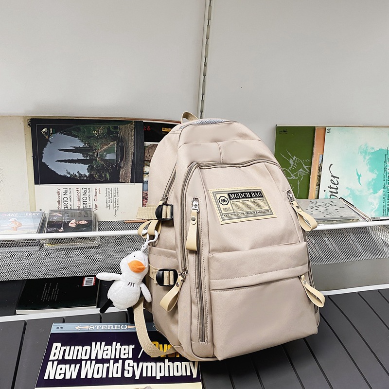 Nueva mochila femenina estudiante universitario estudiante de secundaria estudiante de escuela secundaria estudiante chica mochila simple gran capacidad niños mochila al por mayor