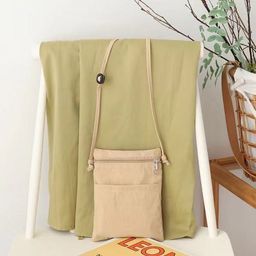 New Japanese-style casual nylon mobile phone bag for women—trendy, versatile, perfect for shopping; lightweight and stylish shoulder/crossbody option.