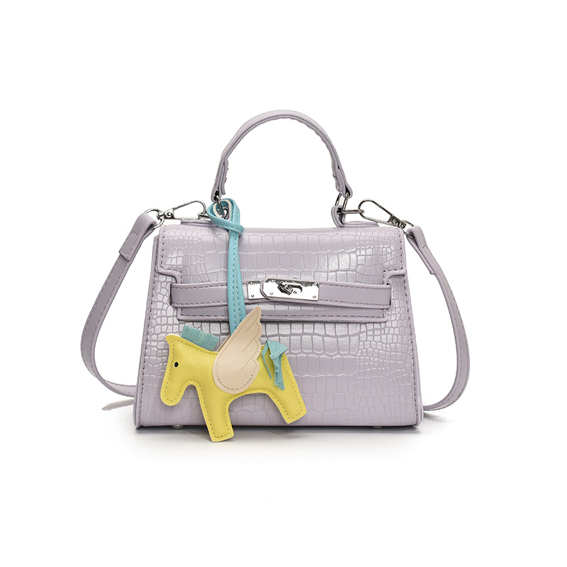 Bolso Kelly de mano de alta gama para mujer 2025 nueva moda casual bolso de hombro con patrón de piedra moda bolso de mensajero de color sólido