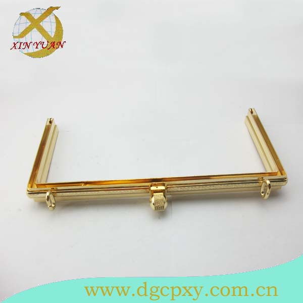 厂家生产浅金色手袋包扣， 锌合金开关按钮， 各种手袋口夹