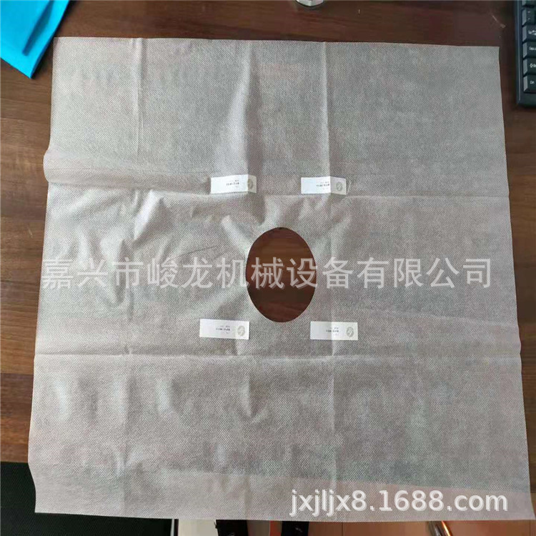 生产一次性护理垫单中单机器 无纺布床单折叠机 打孔洞巾孔巾设备