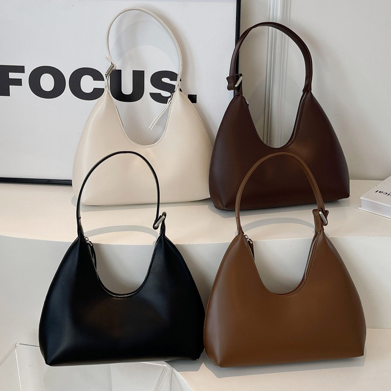 Axilas femininas 2024 novas em formato de crescente minimalista com temperamento versátil, viagens casuais, textura portátil,_voghion.com