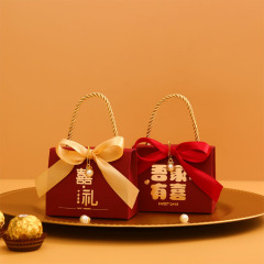 2022年新作ウェディングクリエイティブ中国風お菓子箱ネット人気ハンドバッグ型キャンディバッグ結婚式記念品箱大赤色