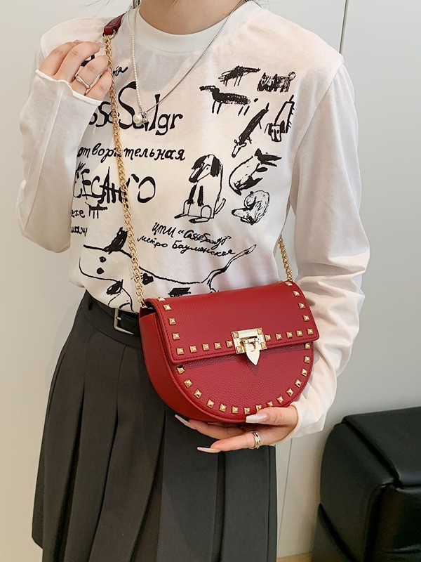 Cross-border 2025 nuevo remaches decoración de color sólido moda multifuncional mochila de hombro con cadenas de bloqueo cinturón de hombro bolsa de sillín