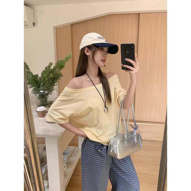 スターの同じタイプの斜め肩の半袖の女性の肩のtシャツの夏の純粋な欲のギャルのゆったりしている黒色の1字の肩の上着