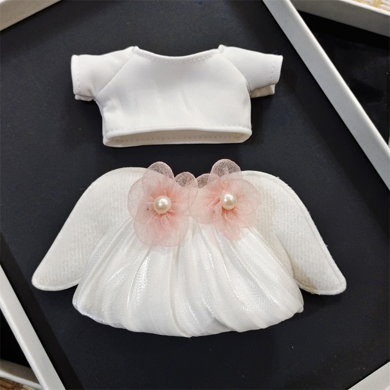 Venta caliente perro cabeza 14cm muñeco de peluche suéter colección de accesorios de ropa rabu ropa spot al por mayor