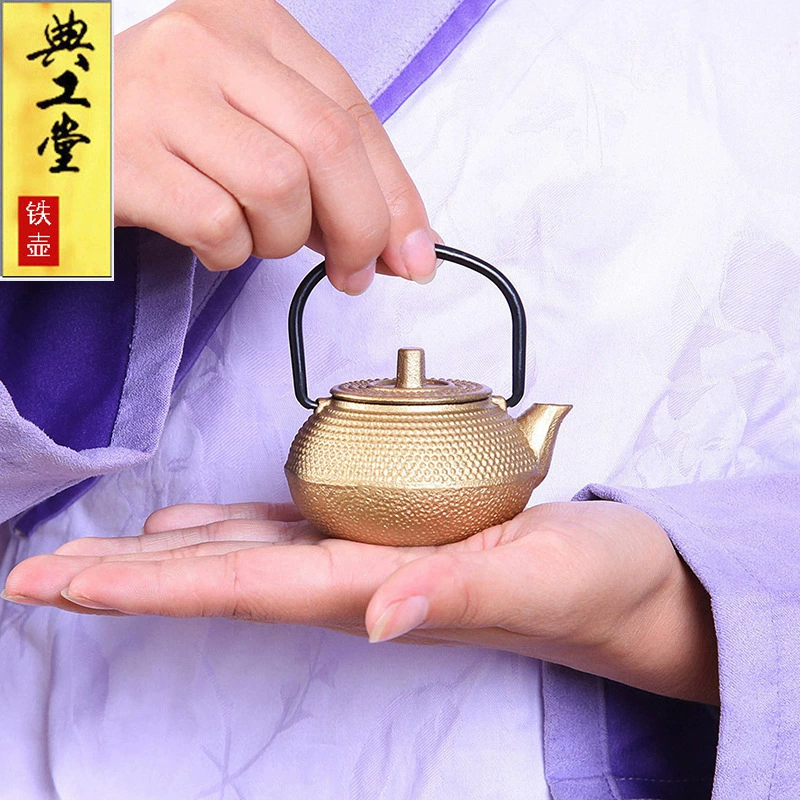 « Mini iron pot imitation Japanese cast iron teapot small gold pot raw iron kung fu tea set for many options» должен быть переведен на русский