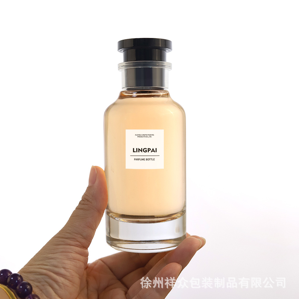 Venta al por mayor al por mayor al por mayor de perfumes transparentes cilíndricos de alta gama en botellas de aceite esencial en aerosol, un conjunto completo de tapas y muestras pequeñas presionan botellas vacías