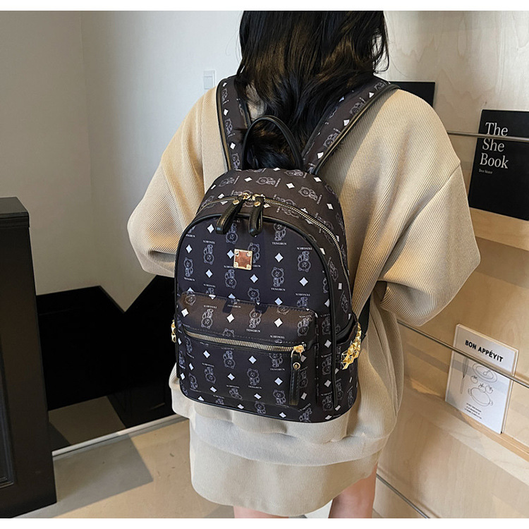 A cute little bear backpack for female college students in 2025, a new fashionable and trendy backpack with a large capacity undefined