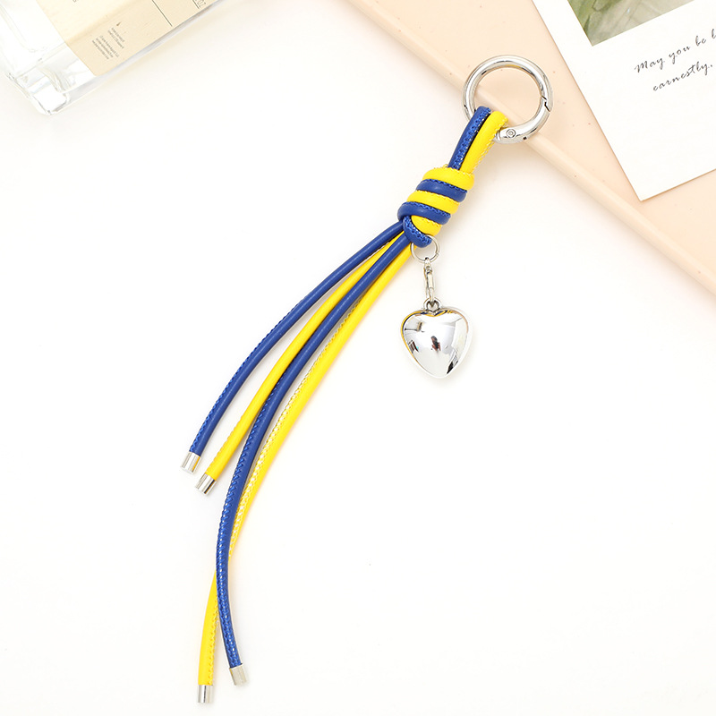 Nuevo tipo de cuerdas de cuero PU llavero colgante in bolsos de moda colgante cadena accesorios DIY tejido a mano