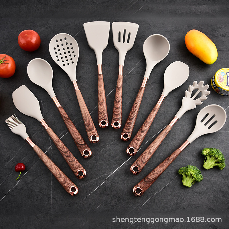 Utensilios de cocina de grano de madera chapados en oro de silicona Juego de 11 piezas Cocina doméstica Olla antiadherente Cuchara de cocina Cubo de almacenamiento de mango cubierto