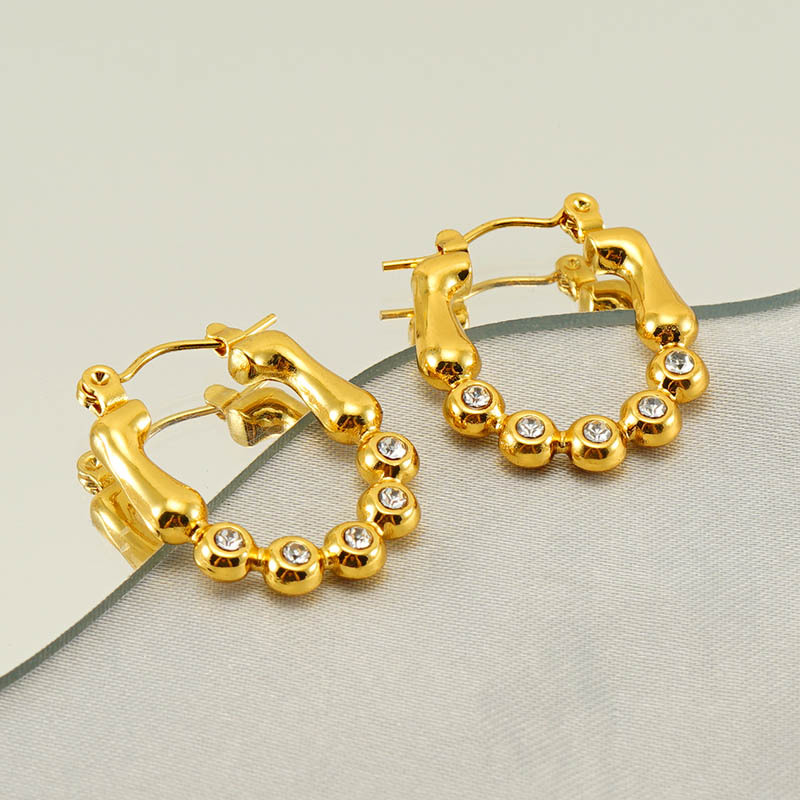 Pendientes de perlas de acero inoxidable de estilo de venta caliente transfronteriza pendientes de diamantes irregulares geométricos de oro 18K pendientes de acero de titanio