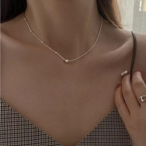 All-over 925 sterling silver simple asymmetric round bead snake bone splicing necklace for women with niche design and minimalist temperament