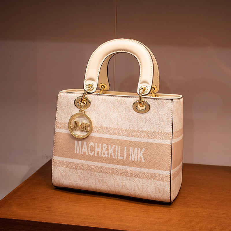 Hong Kong marcas de alta marcas de cuero real Diana bolsa para mujeres 2023 nueva moda alta sensación de hombro grande bolso de mano de mujer