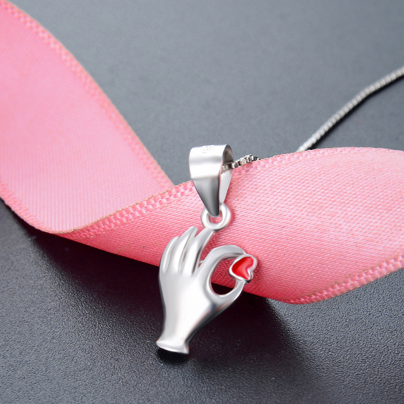 S925 plata esterlina gestos ok colgante nicho diseño pequeño amor colgante de plata estudiantes colgante de dinero al por mayor