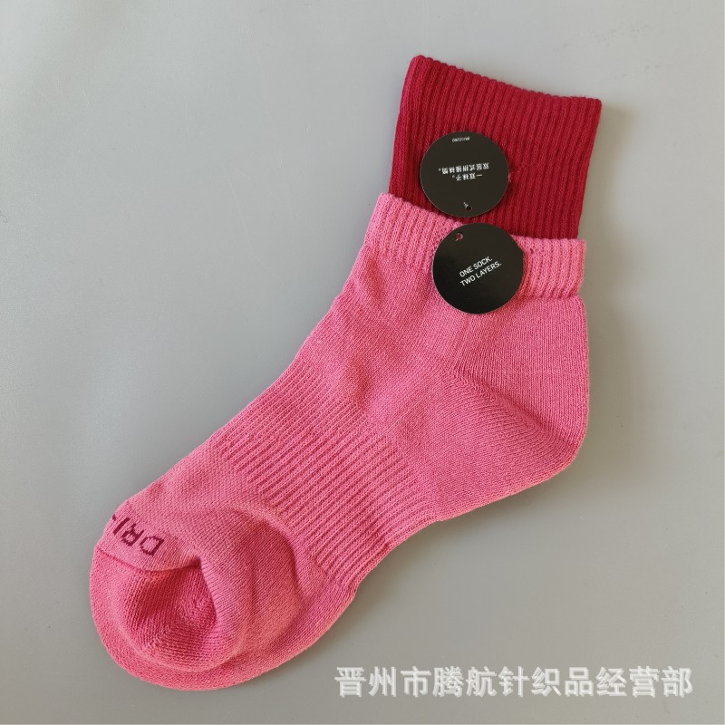 蘇万ナイキの靴下のカラーの二重は男女の中で長い筒のタオルの底のスポーツの靴下をつなぎ合わせてバスケットボールの靴下を走ります。