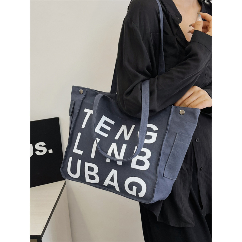 2024 New Korean Style Homemade Magnetic Buckle Cross Version Stiffy Thick New Oversized Letter Inner Bag Tote Canvas Trendy Bag 2024 New Korean Style Homemade Magnetic Buckle Cross Version Stiffy Thick New Oversized Letter Inner Bag Tote Canvas Trendy Bag