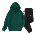 Dark green clothes + black pants, white label