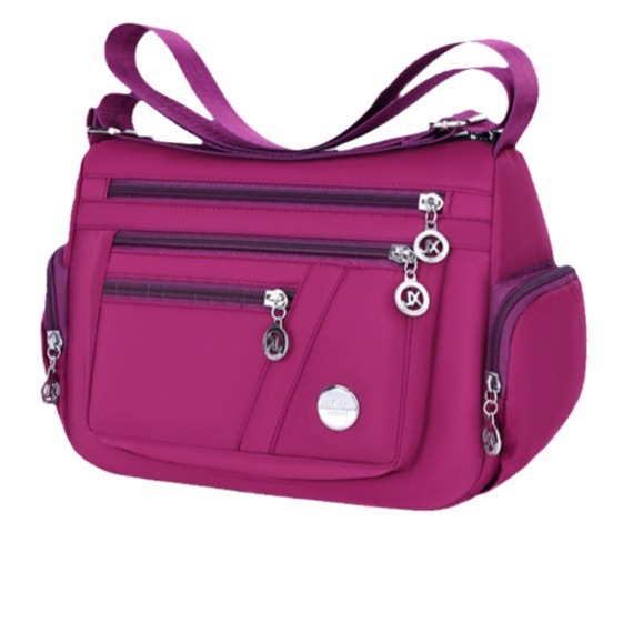 Moda multi-cremallera mochila casuales multicapa bolsa de mamá ligera 2024 nueva gran capacidad madre estilo extranjero hombro único