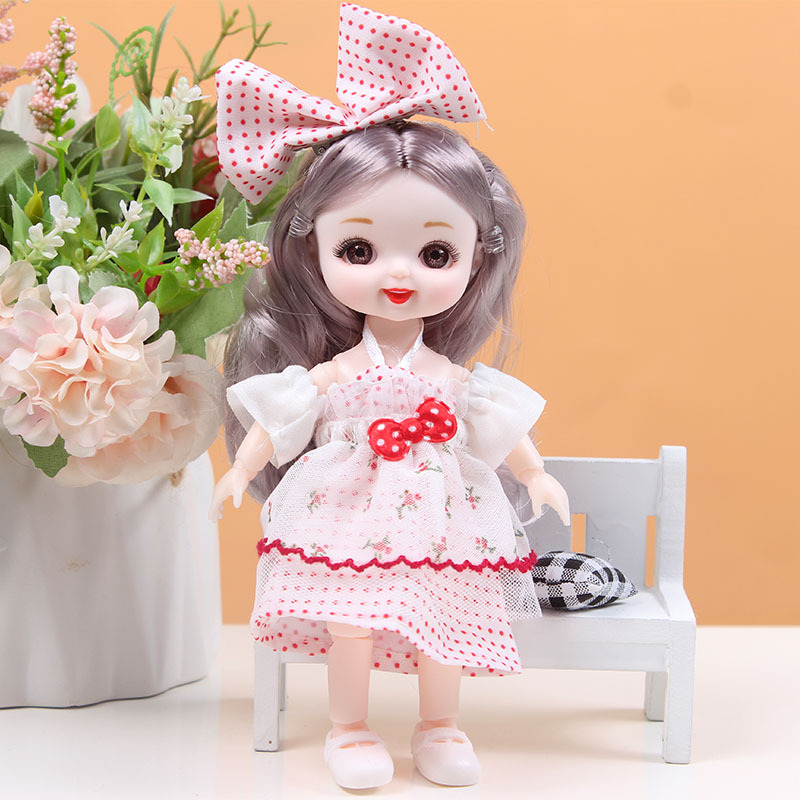 17 cm caja de regalo conjunto de marea constante muñeca Barbie muñeca muñeca cambiante articulaciones muñeca estand móvil