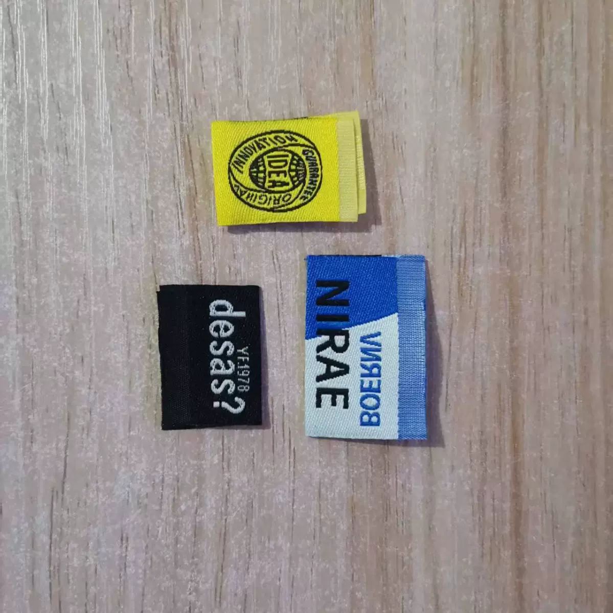 厂家直供织唛现货 服装鞋帽被套家纺水洗唛胸标肩章领标布标商标