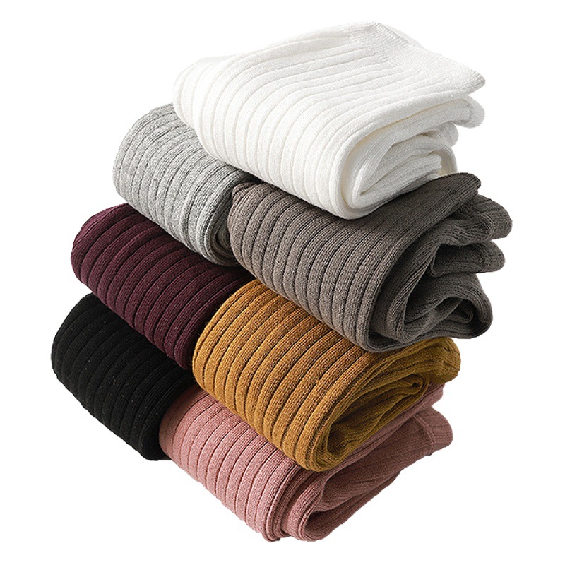 Primavera, Otoño e Invierno nueva princesa bebé polainas al por mayor de los niños de color sólido rayas verticales bebé pantimedias