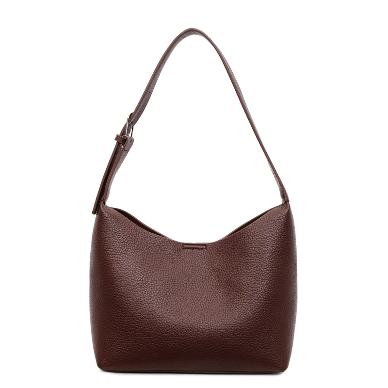 Bolsos de cubo retro de alta calidad para mujeres otoño / invierno 2025 nuevo nicho Zhong commuting mochila de hombro bolso de trabajo diario