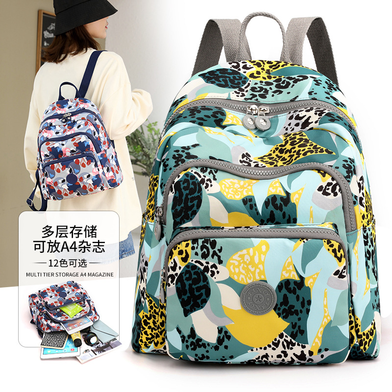 Bolsa de ocio para exteriores, gran capacidad, mochila de viaje versátil de nailon estampada para mujer, mochila de viaje moderna y sencilla