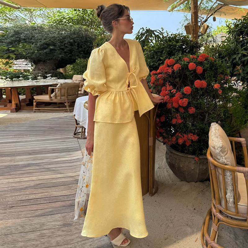 European and American Cross-Border Women's Clothing 2025 Summer New Fashion Puff Sleeve V-Neck Tie-Up Top High-Waisted Skirt Set European and American Cross-Border Women's Clothing 2025 Summer New Fashion Puff Sleeve V-Neck Tie-Up Top High-Waisted Skirt Set