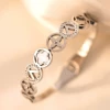 Wide version of four-leaf clover hollowed-out steel color