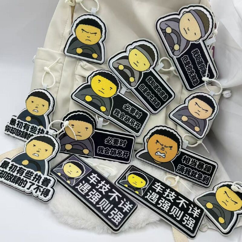 Popular Road King cartoon-themed, quirky, non-woven fabric electric vehicle license plate keychain, featuring fun text and serving as a backpack accessory