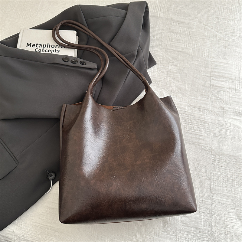 Otoño e invierno viaje bolsa de hombro para mujeres 2024 nueva moda retro de alta capacidad bolsa de tote bolsas de brazo de alta sensación