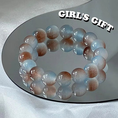小紅の本の同じタイプのココナッツの氷のアメリカの瑠璃の手の串の女性のグラデーションは指の柔らかい氷の透の手環の学生の親友の贈り物を巻きます。