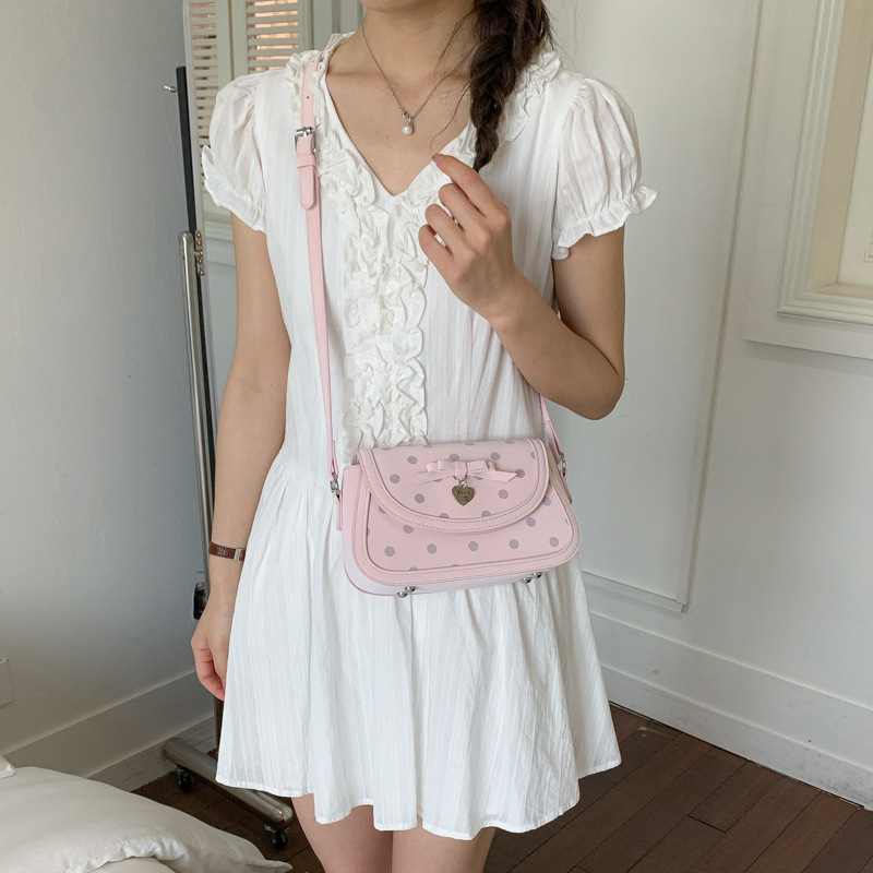 Inspiración coreana de punto de hombro mochila de hombro de mujer bolso de arco pequeño bolso cuadrado de diseño diario de moda