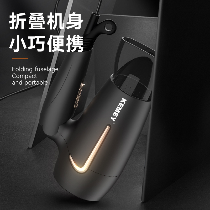 Secador de pelo eléctrico Kemei con viento fuerte y funcionamiento silencioso para uso doméstico, secador de pelo pequeño y plegable KM-6834.