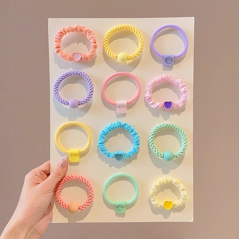 Banda de goma de color para niños niñas atadas cabello cuerda de cabello de alta elasticidad cuerda de cabello duradera de cabello de alta calidad anillo de cabello cubierta de cuero