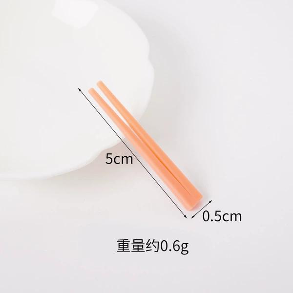 Small orange detachable chopsticks