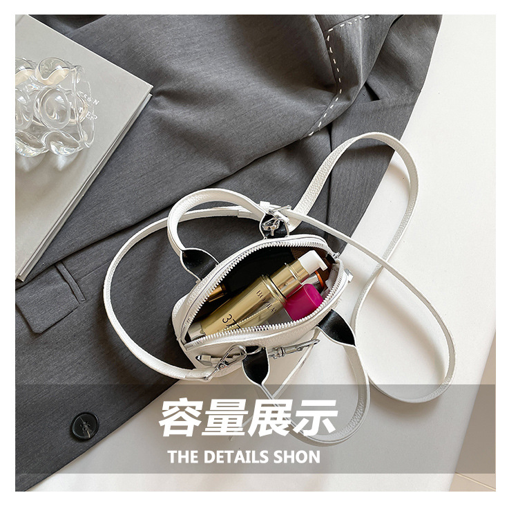 A simple and individual hand-held shell bag, a new Spring/Summer 2025 niche fashion casual shoulder bag, a trendy and stylish crossbody bag undefined