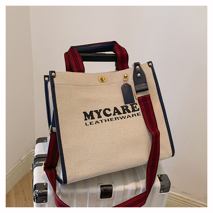 Bolsa de mano de lona de gran capacidad para mujeres 2024 nueva moda impresa letras mochilas bolsa de viaje casual