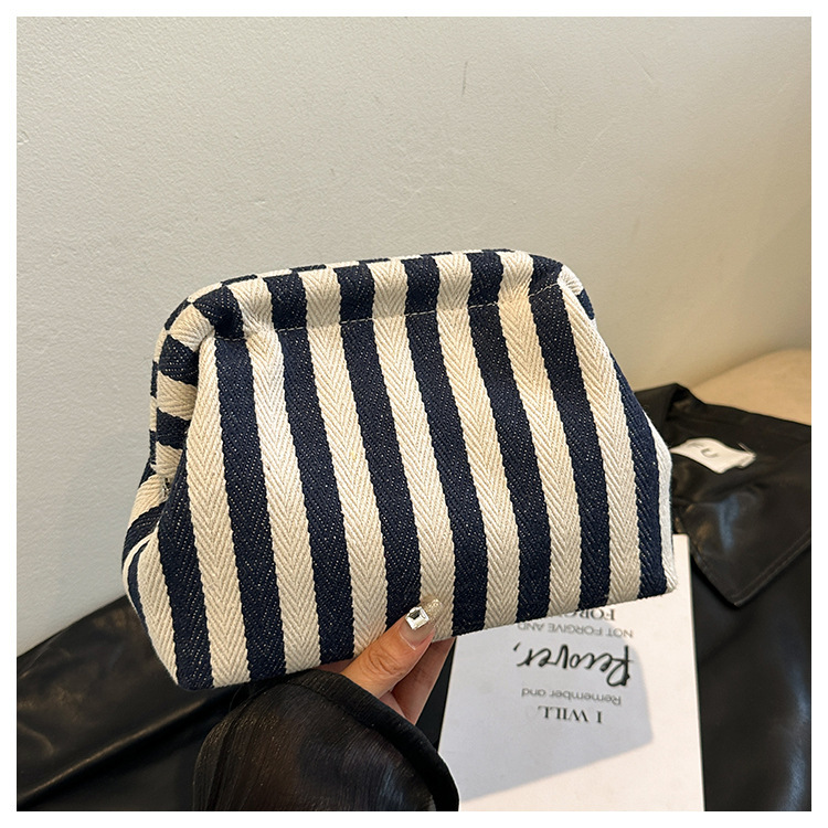 New cross-border fashion color-blocking striped cosmetic bag, women's loose change mobile phone storage bag, trendy and niche cloud clutch undefined