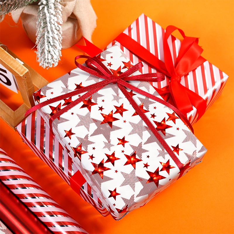 Transfronterizos para estrellas rojas estampadas de oro papel de embalaje de regalos de Navidad de lujo ligero papel de regalo de alto nivel DIY al por mayor