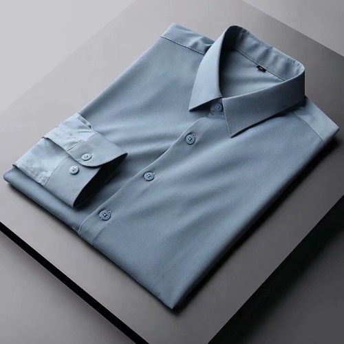 Camisa de manga larga de color sólido estilo coreano de los hombres de Moda Ropa superior casual diseño sentido ins marca de moda camisa suelta y guapo