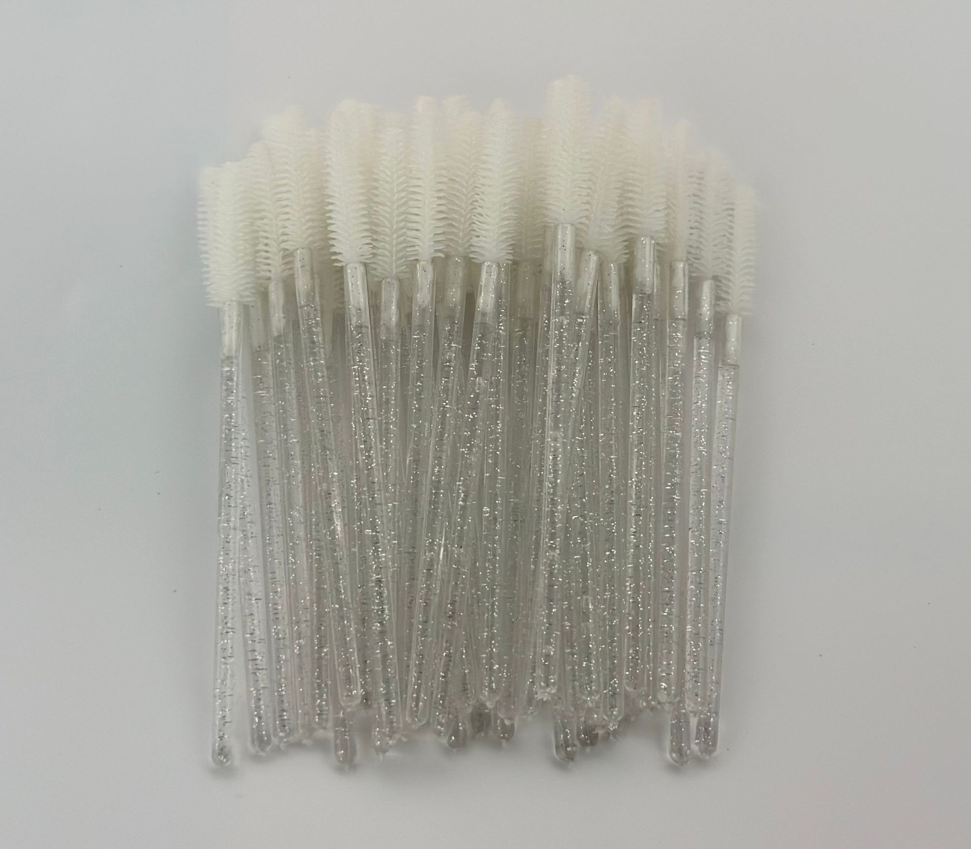 Transfronterizo mayorista cepillo de pestañas de silicona barra de cristal belleza herramientas de belleza de pestañas de silicona cabeza cepillo de maquillaje de pestañas