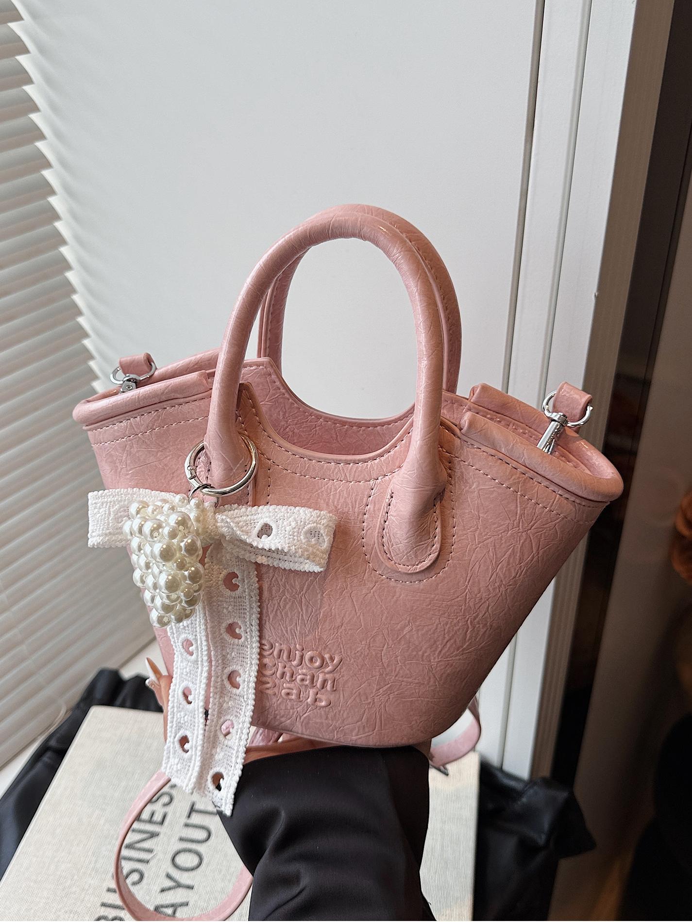 Bolso de cubo de mano de nicho de comercio exterior 2025 nuevo producto bolso de mensajero de moda casual de todo fósforo bolso de hombro de viaje de trabajo de moda