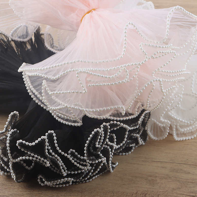 Los fabricantes más vendidos tienen una gran cantidad de existencias al por mayor de materiales de embalaje de flores frescas, hilo de malla, color sólido, hilo de onda plisado de color sólido, hilo de malla