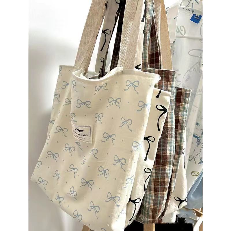 New leisure tote bag shoulder bag Korean minority girl diagonal bag wholesale large capacity commuter fashion canvas